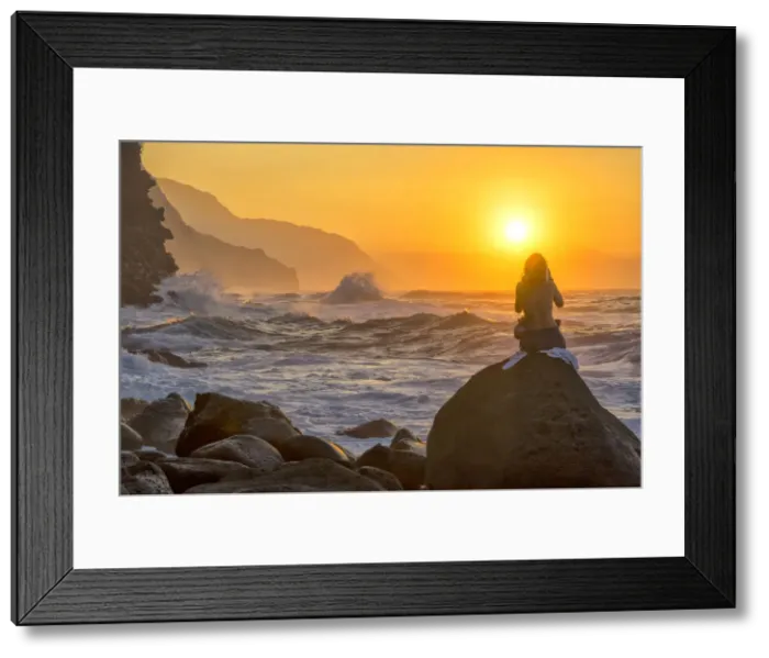 Framed Print : Kauai. USA, Hawaii, Kauai, Haena State Park, Na Pali Coast, woman watching sunset