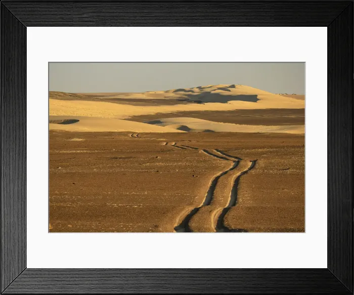 Framed Print : Desert. Landscape with car ruts near Serra Cafema Camp