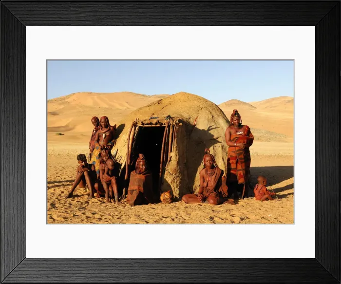Framed Print : Namibia. Himba women at hut, village near Serra Cafema Wilderness Safaris at Kunene River